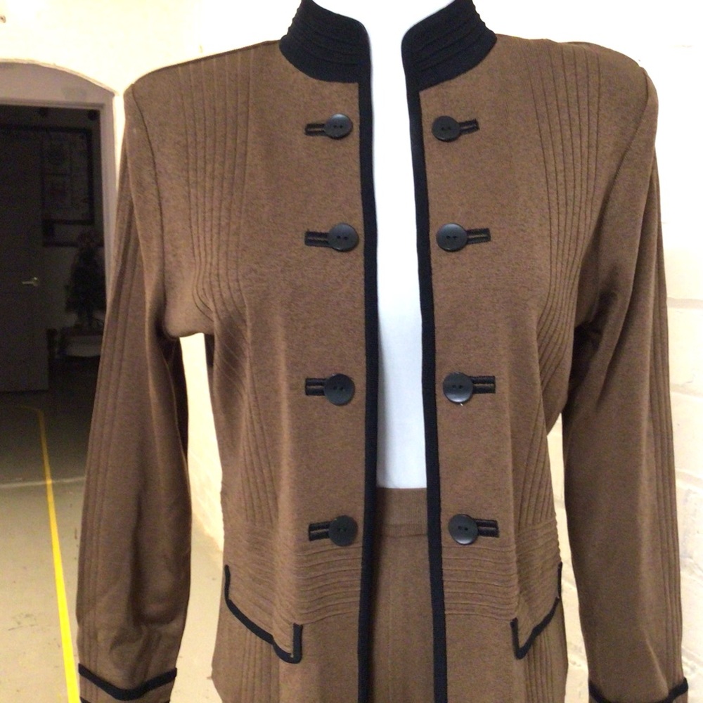 Brown knit pantsuit with black trim and buttons